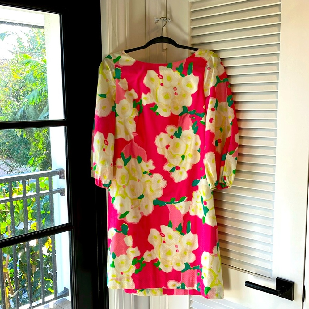 Lilly Pulitzer flower print dress with balloon sleeves.